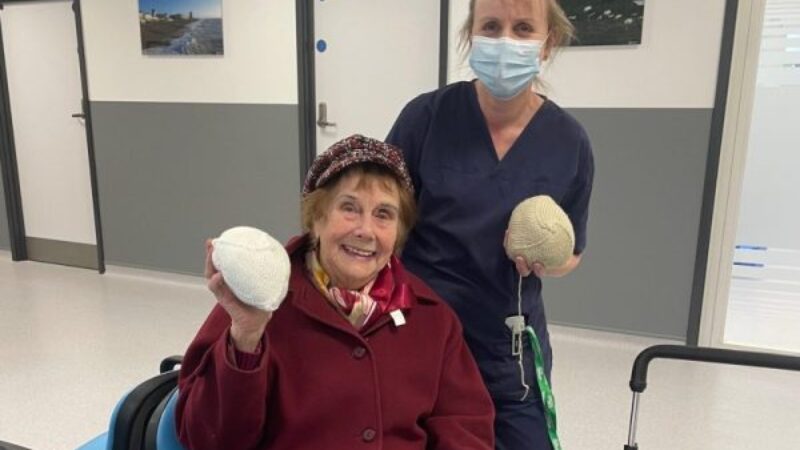 Bella and Sarah with the knitted prostheses